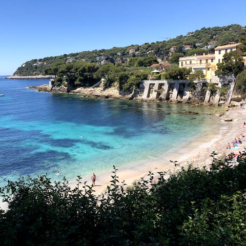 Walk down to Espalmador Beach and sunbathe by the crystal clear water