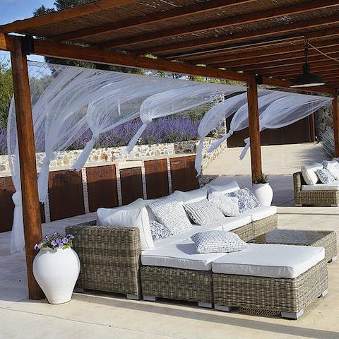 Relax to the scent of lavendar, shaded by the pergola
