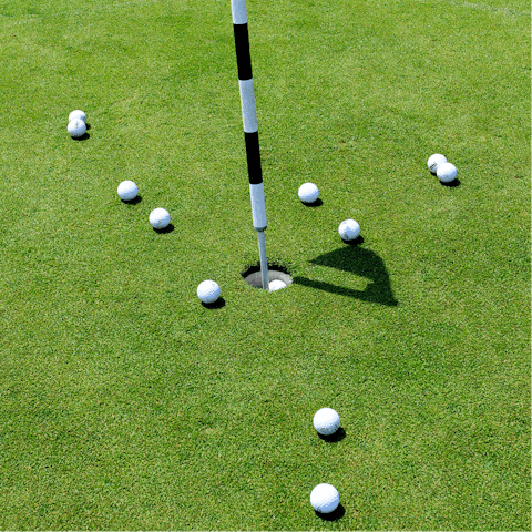 Play a round at the eighteen-hole golf course