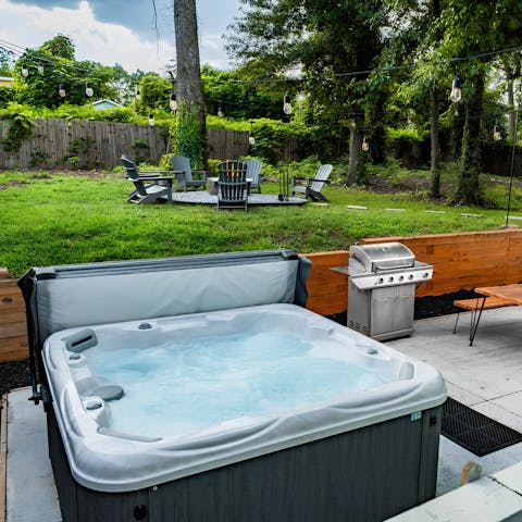 Unwind in the hot tub on the patio