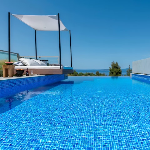 Cool off with a dip in the private or shared pools