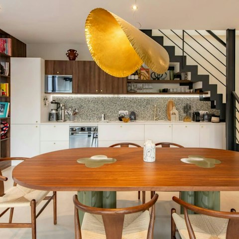 Enjoy a glass of Champagne at the dining table