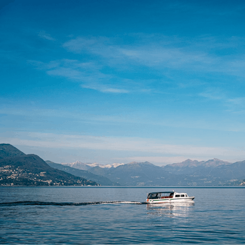 Walk a few minutes to the ferry terminal and cruise around Lake Como