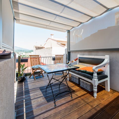 Mix up a jug of sangria and enjoy out on the home's terrace
