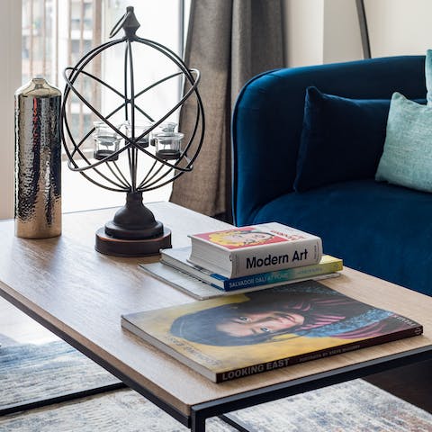 Flop down on the velvet sofa and flick through the coffee table books