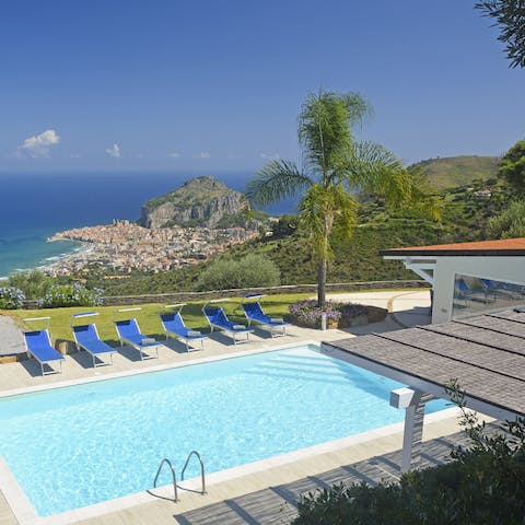 Gaze out at the glistening Mediterranean as you float in the pool