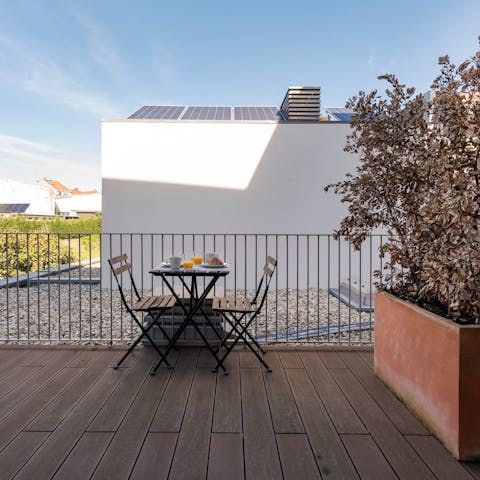 Enjoy a pastel de feijão on your private balcony