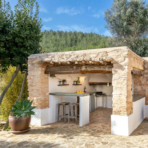 Whip up a cocktail in the summer kitchen