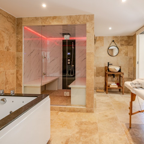 Enjoy a restorative session in the home sauna and Jacuzzi