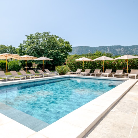 Find peace and relaxation while lounging by the pool