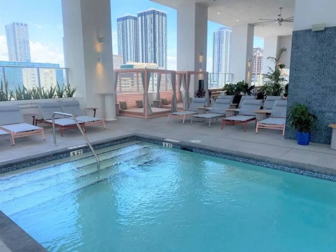 Spend sunny afternoons by the shared rooftop pool