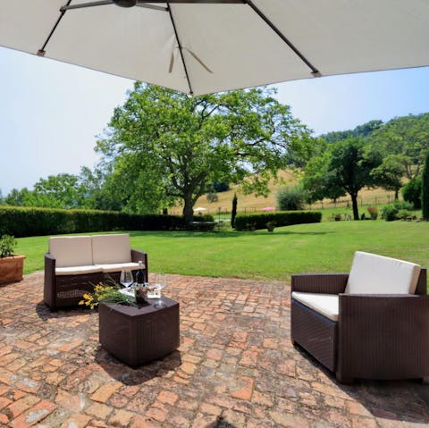 Enjoy a glass of local Italian wine on the patio terrace
