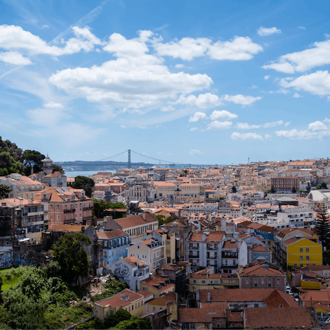 Look out over the city's rooftops towards the River Tagus from the splendid terrace at Miradouro da Graça – just 300 metres up the hill