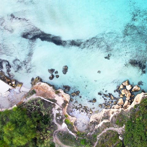 Discover the white sands, turquoise waters and freshwater springs of Fontane Bianche