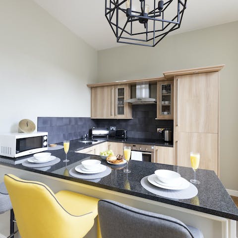 Indulge in some coffee and pastries at the plush breakfast bar