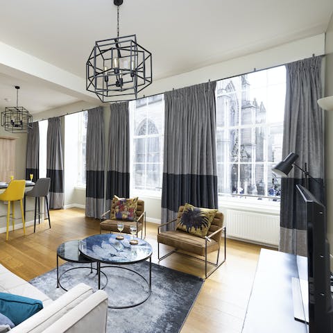 Enjoy a nightcap watching the sun go down through the floor to ceiling windows