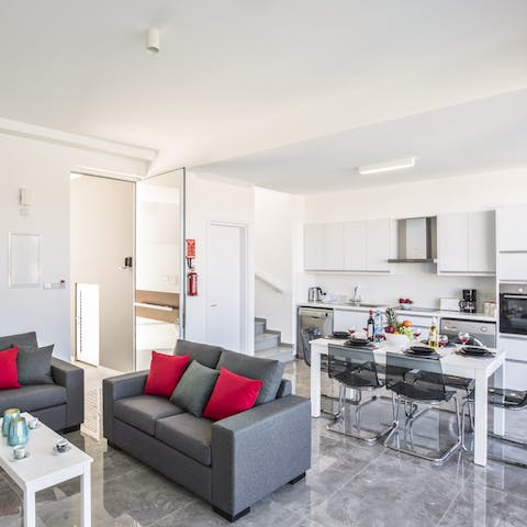 Cook up a storm and eat together in the open-plan kitchen and living area