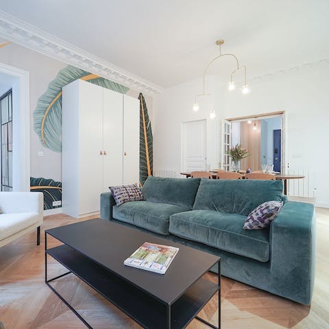 Kick back in the chic living room with a glass of French wine after a day of seeing the sights