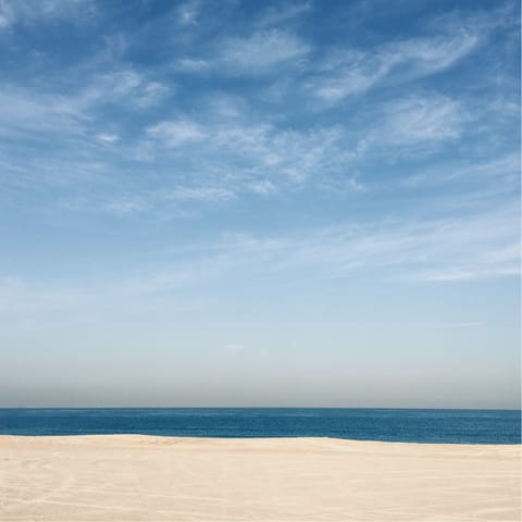 Slap on your sun cream and relax on the nearby beach