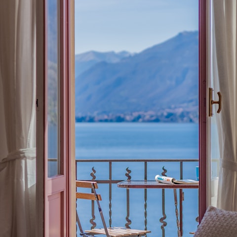 Sip Spritz on the balcony after a day on the lake
