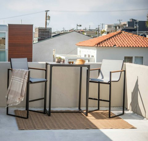 Catch the afternoon sun on the balcony above the Manhattan Beach