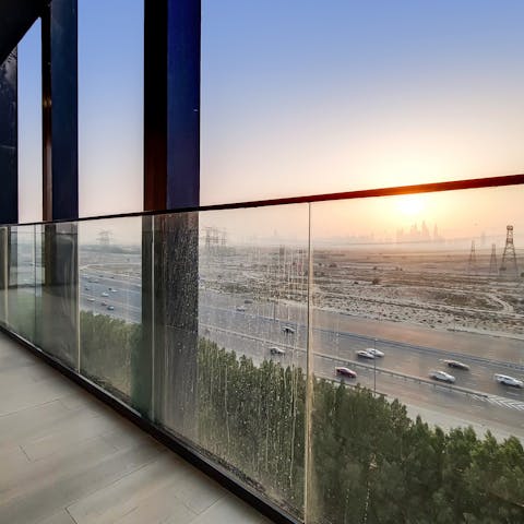 Grab some evening air on your little balcony as the sun sets