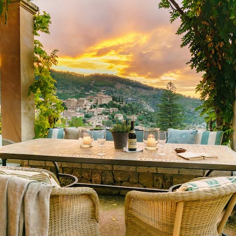 Look out across Deia village as you enjoy an evening aperitif