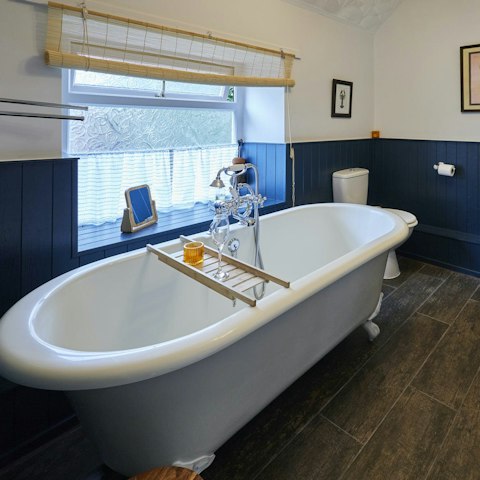 Have a long soak in the roll-top bath after visiting nearby Staithes