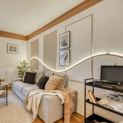 Hit play on the record player and unwind in the cosy living area