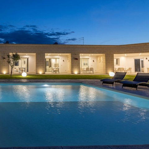 Swim under starry skies in the shared swimming pool