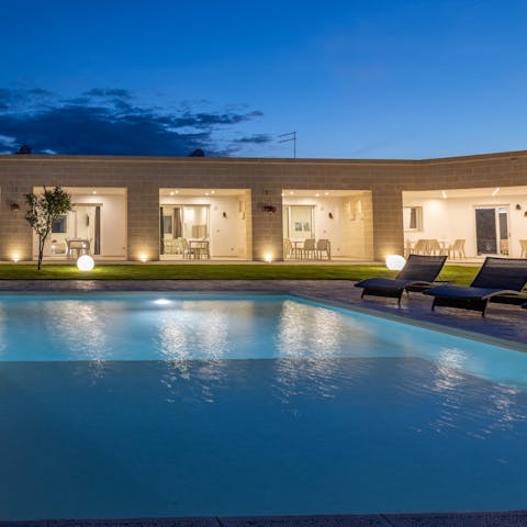 Swim under starry skies in the shared swimming pool