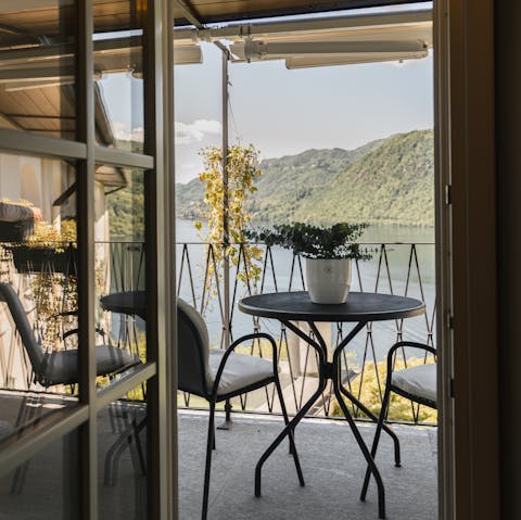 Enjoy an aperitif on the private balcony with a gorgeous view