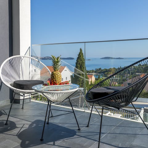 Start the day with a cup of coffee on your bedroom's balcony