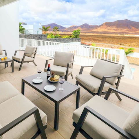 Enjoy a glass of sangria with mountain views