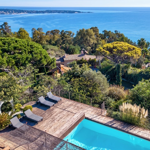 Stretch out by the pool with uninterrupted views of the Med