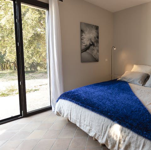The large French doors in the master bedroom mean you can walk straight out of bed to the garden