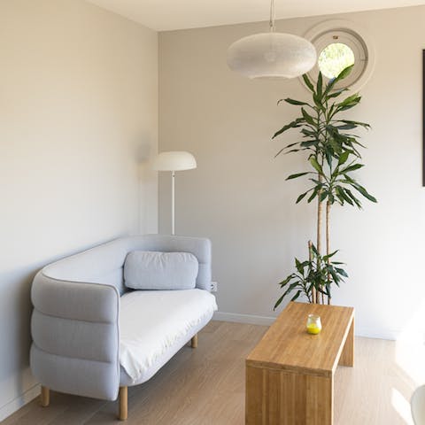 It's not all colour -  some spaces remain simple, making use of plants and natural light for a Zen feel