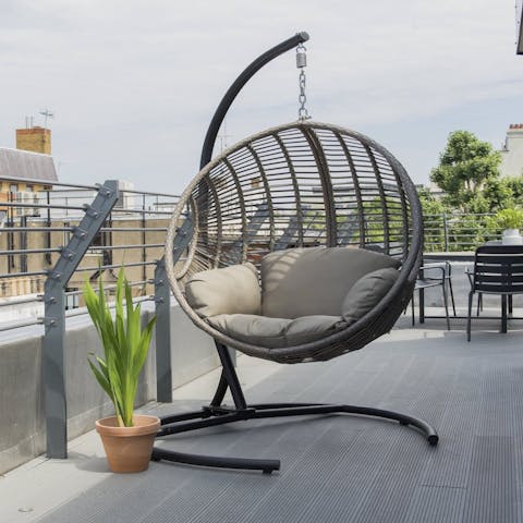 Spend lazy afternoons outside in the hanging swing chair