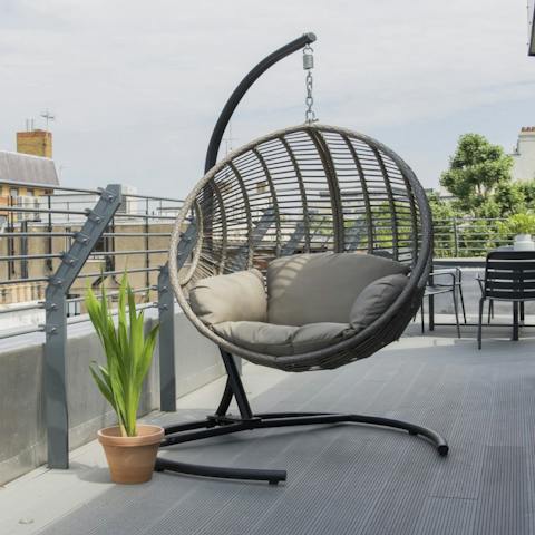 Spend lazy afternoons outside in the hanging swing chair