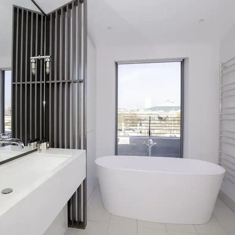 Enjoy a soak as you take in the skyline views from the freestanding tub