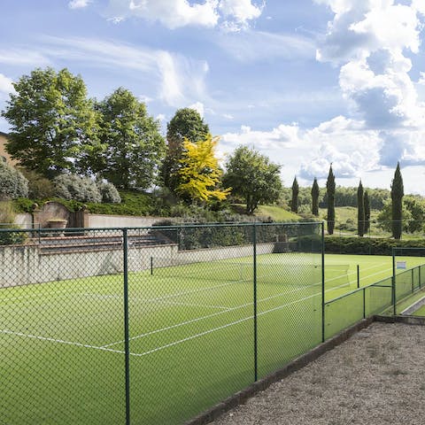 Unleash your inner Berrettini on the resort's grass tennis court