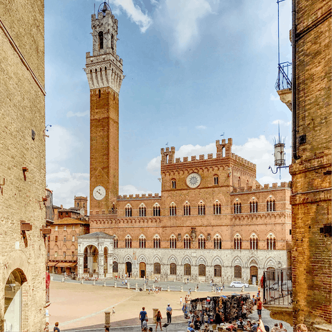 Explore the ancient streets of Siena, a thirty-minute drive from home