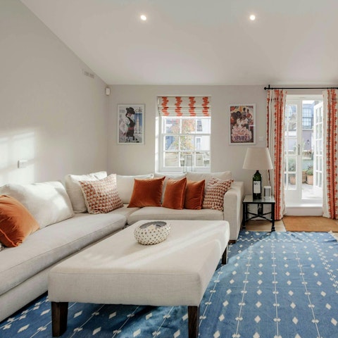 Take your pick from two elegant sitting rooms to relax in