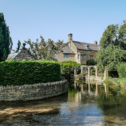 Explore picturesque Bourton-on-the-Water, a short drive away