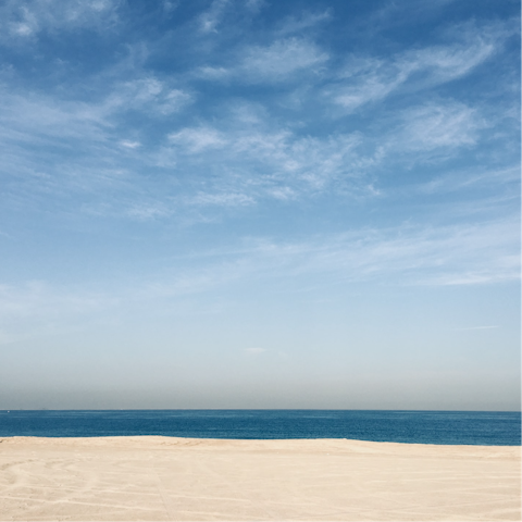 Bask in the sunshine on Jumeirah Beach, a fifteen-minute drive away