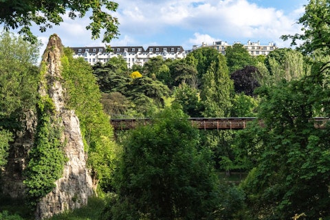 Explore Bois de Boulogne's vast lakes and woodland paths, a thirty-minute walk