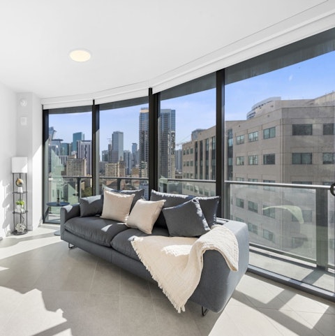 Take in the city skyline from the living area