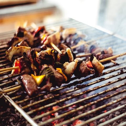 Pick up some produce at a local farmers' market to take home and grill on the barbecue