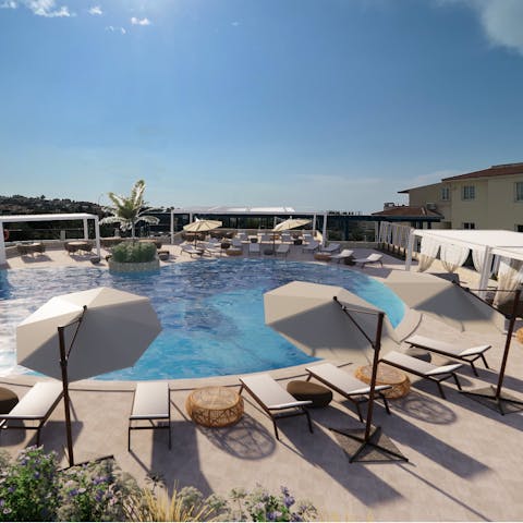 Cool off from the midday sun in the communal pool