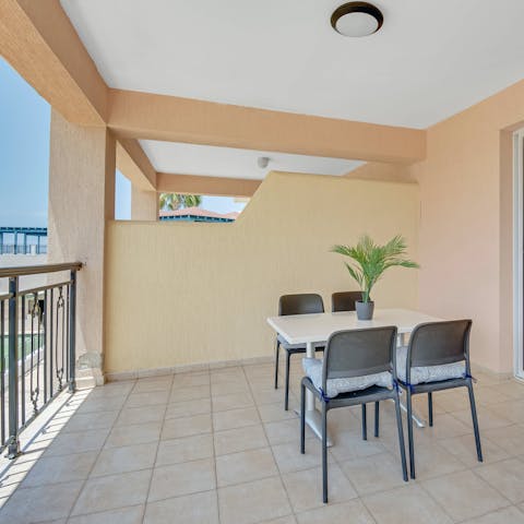 Spend mornings on the balcony with fresh juice and coffee